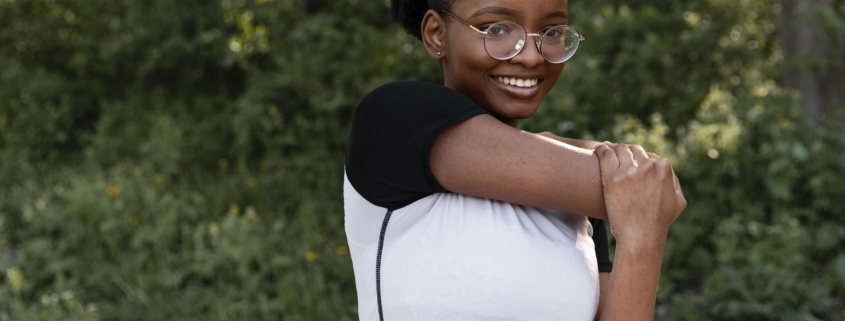 african-woman-working-out-outdoors wellbeing