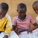 close-up-african-kids-reading-together