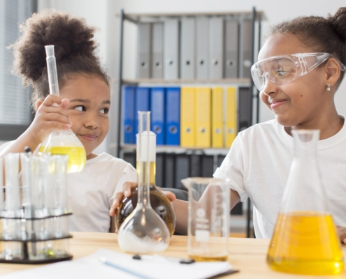 front-view-girl-scientists-home-experimenting-with-chemistry