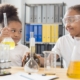 front-view-girl-scientists-home-experimenting-with-chemistry