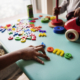 Kids with toys on a table