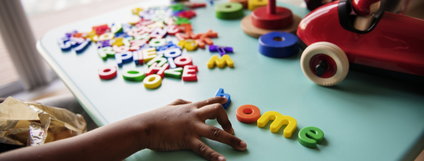 Kids with toys on a table