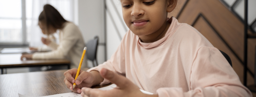Child preparing for exams with sample test paper