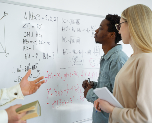 side-view-people-studying-math