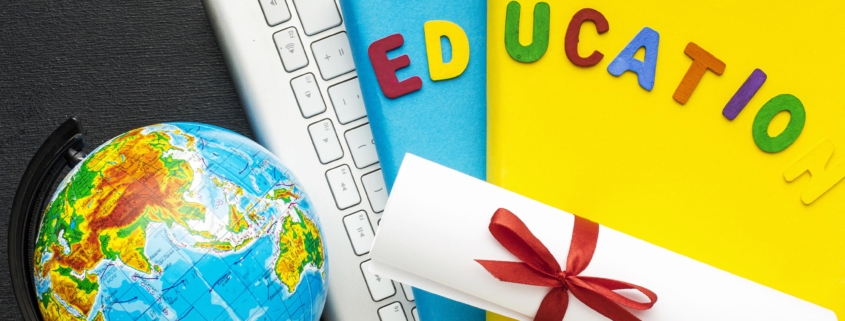 top-view-books-with-keyboard-diploma