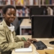 young-woman-studying-library