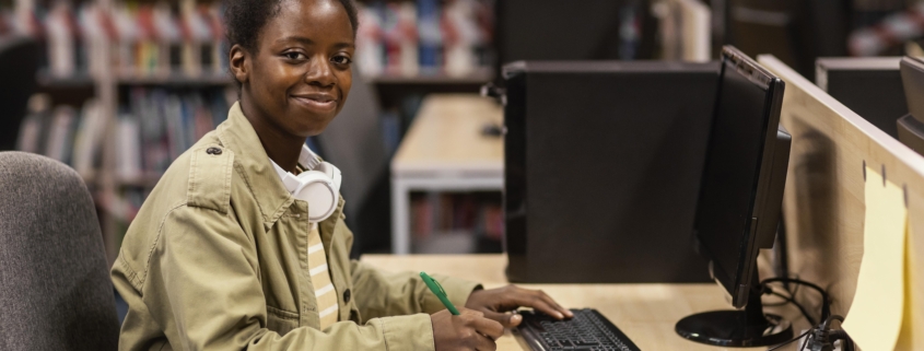young-woman-studying-library